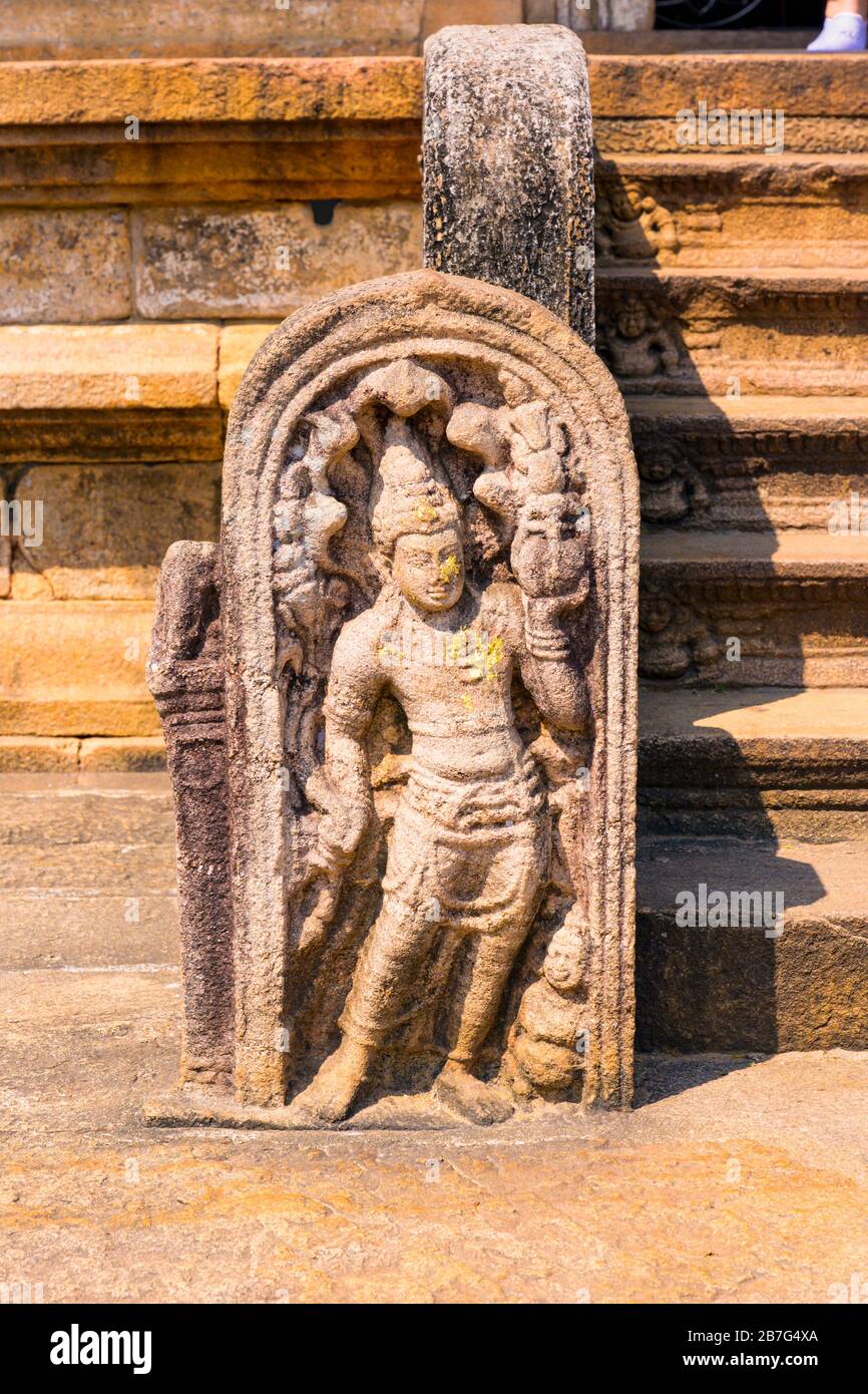 Sri Lanka Anuradhapura Isurumuni Rock Temple Monastery 3 BC built King Devanampiya Tissa sacred shrine stone carving sculpture guard stone figure Stock Photo