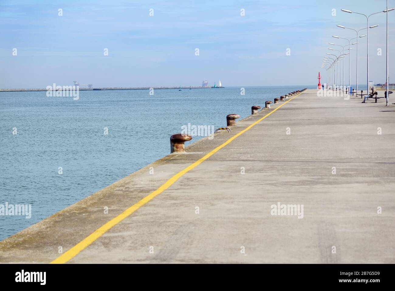 empty concrete floor of pier at port . Stock Photo