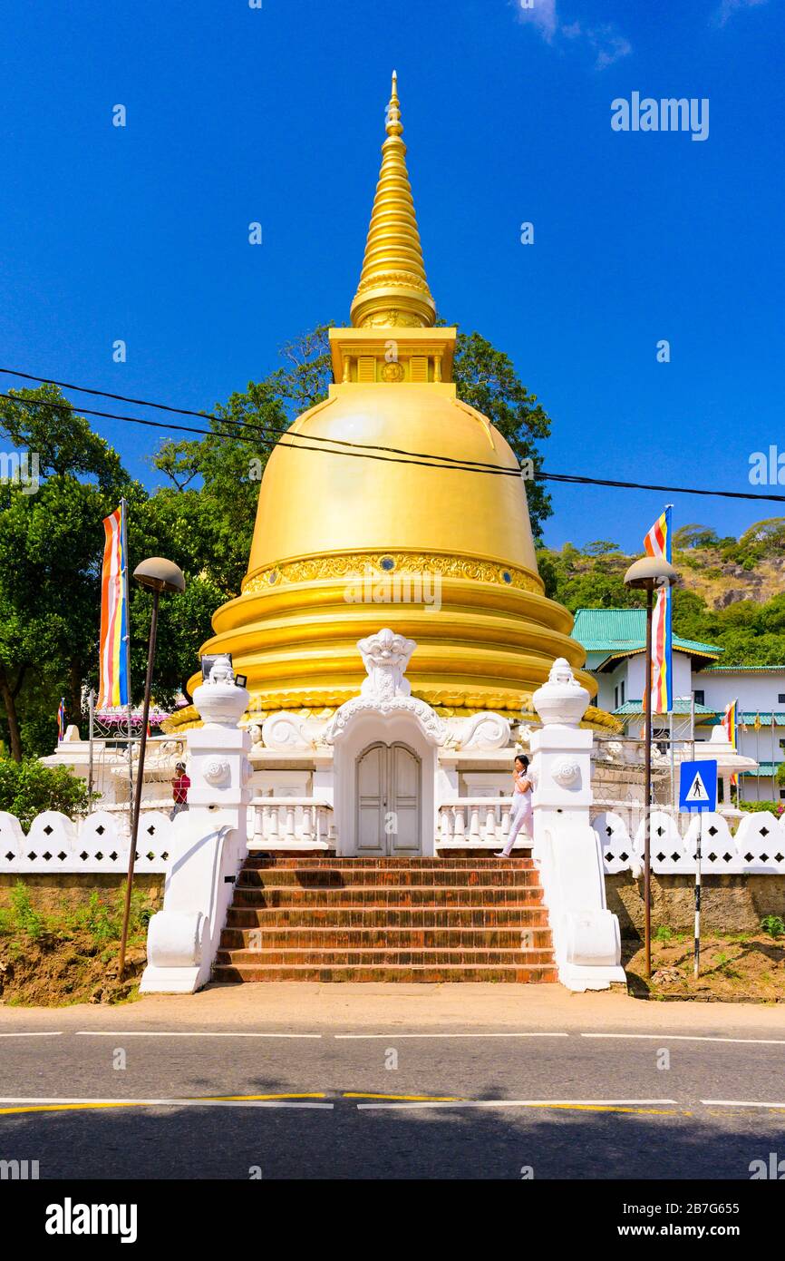 South Asia Sri Lanka Ceylon Dambulla complex gold gilt pagoda dagoba stupa Golden Temple street scene steps stairs Stock Photo