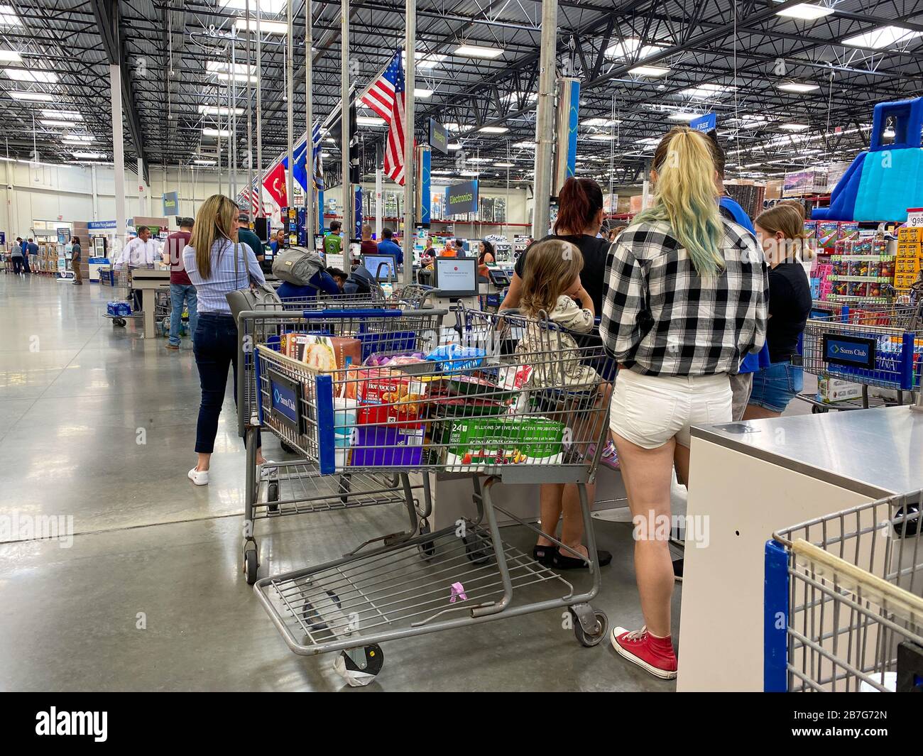 Orlando,FL/USA3/14/20 Customers standing in long lines waiting to
