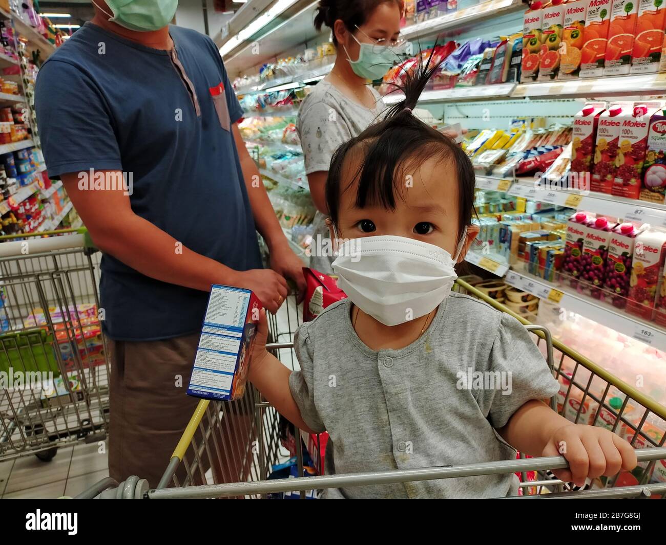 Budva, Montenegro - 17 march 2021: A child with a small trolley in the  supermarket, go shopping with his mother. The family goes shopping Stock  Photo - Alamy