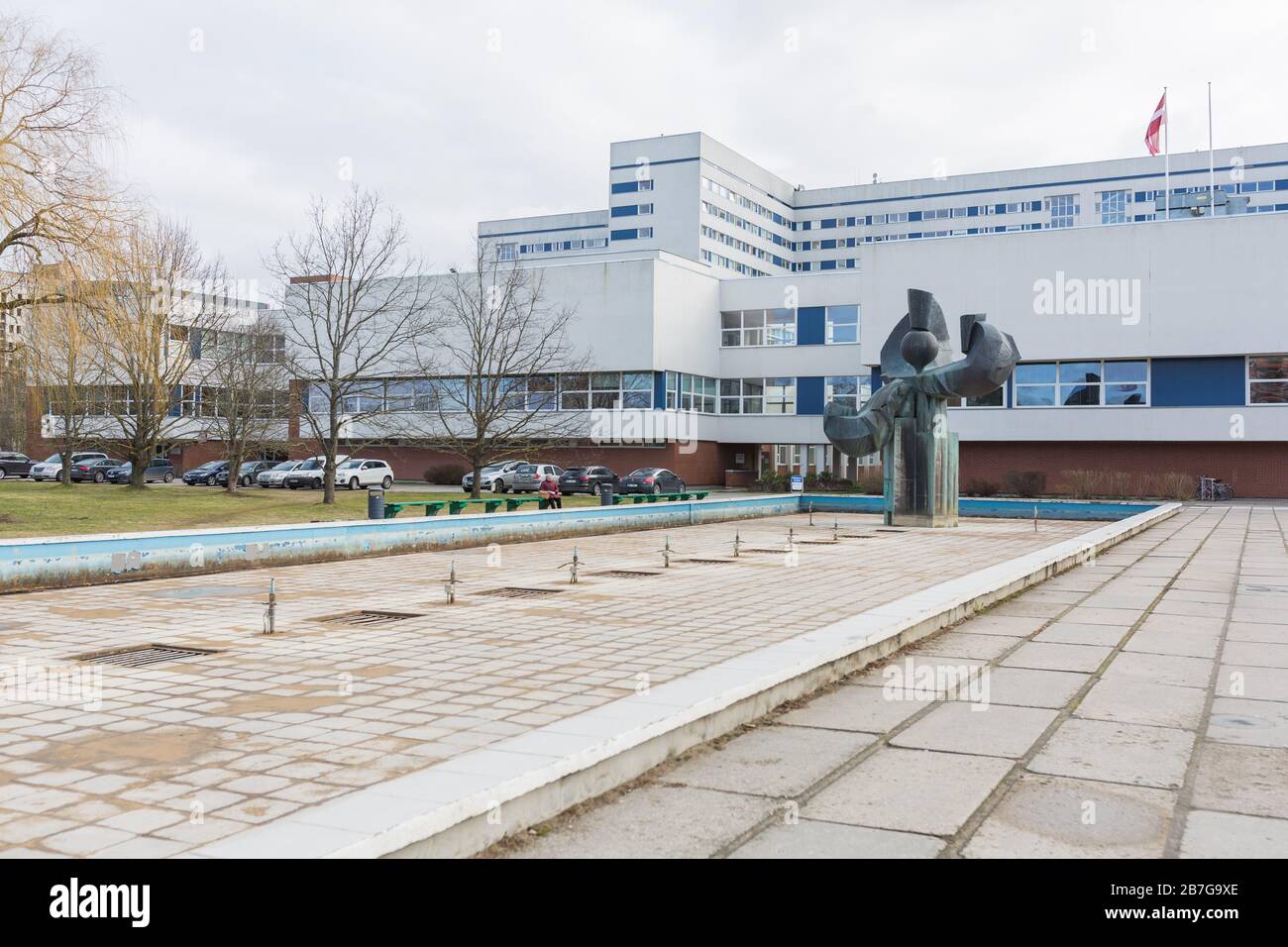 City Riga, Latvia. Hospital facade and surroundings with people and ...