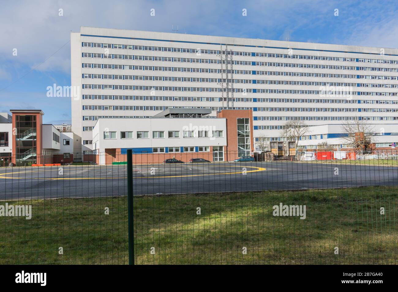City Riga, Latvia. Hospital facade and surroundings with people and ...
