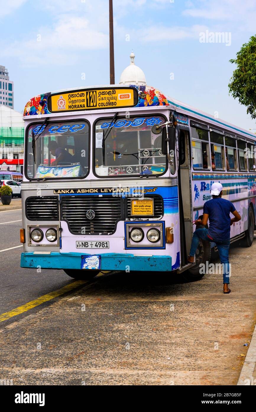 South Asia Sri Lanka Capital City Colombo 7 Alexandra Place Lanka Ashok Leyland 120 bus coach public transport street scene pavement sidewalk Stock Photo