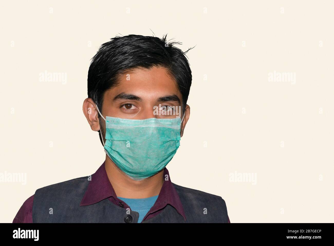 A boy wearing face mask for the protection of corona virus (covid-19),air  pollution and pollen allergy.front view Stock Photo - Alamy