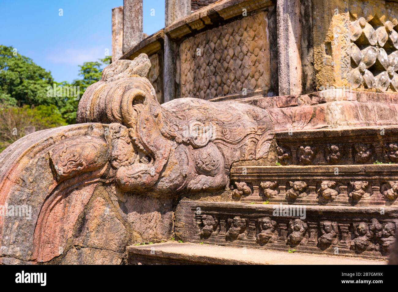 Asia Sri Lanka Polonnaruwa Vatadage staircase balustrade Korawakgala feature dragon 6 animal composite stone Makara Galaeating breathing fire flame Stock Photo