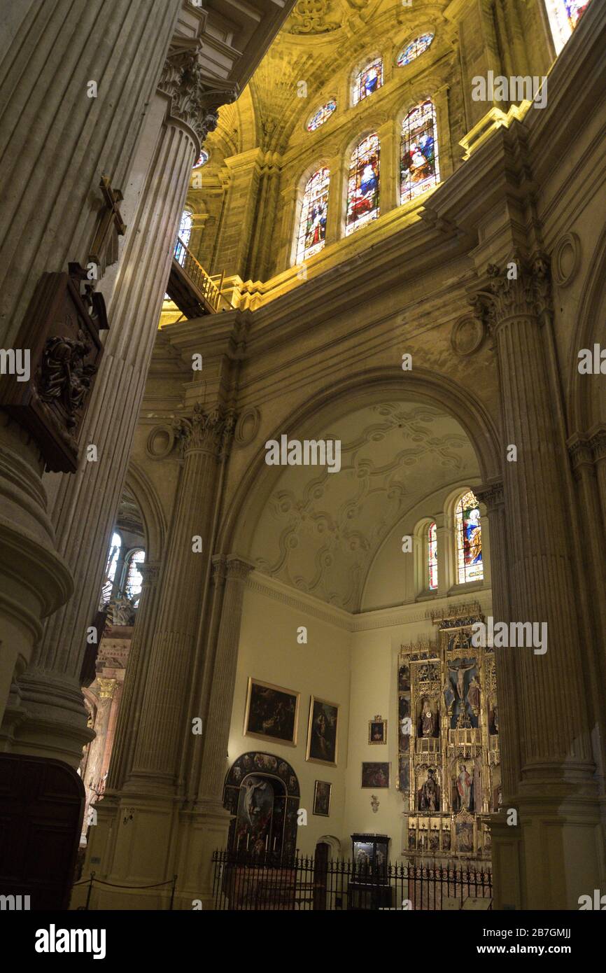 Way of the cross in big pillar and stained glass windows in Malaga Cathedral Stock Photo