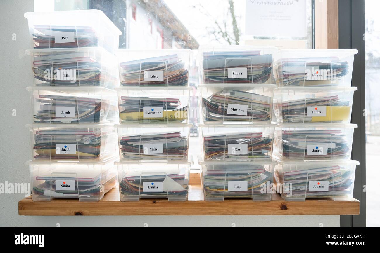 Hamburg, Germany. 16th Mar, 2020. Boxes with teaching materials with the pupils' first names on them are available for collection at the Hoheluft primary school. Due to the corona virus, all schools and day-care centres in the Hanseatic city are closed. Credit: Daniel Reinhardt/dpa/Alamy Live News Stock Photo