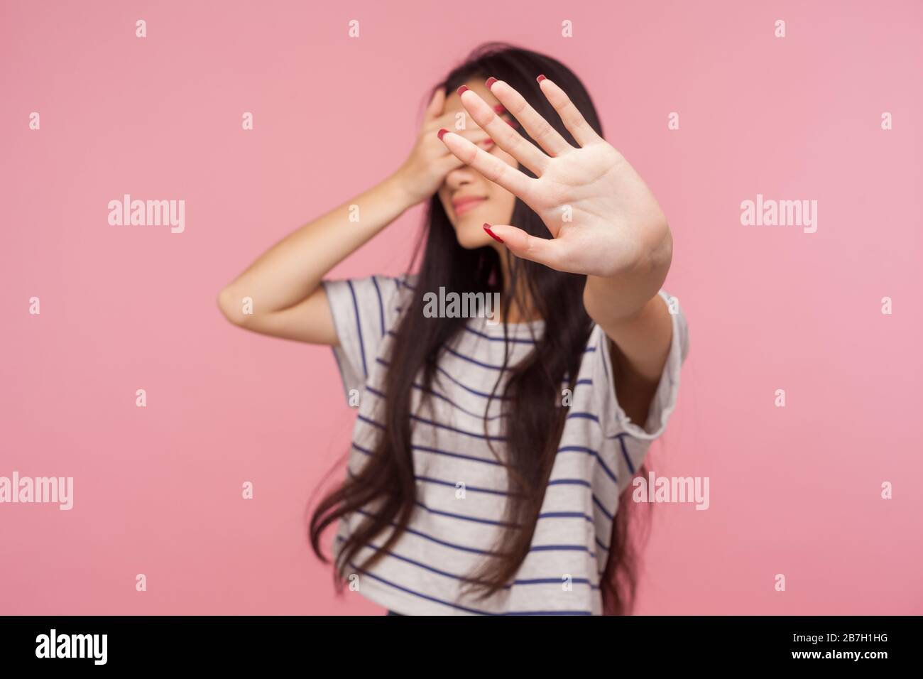 No! Don't want to watch! Portrait of displeased girl hiding eyes ...