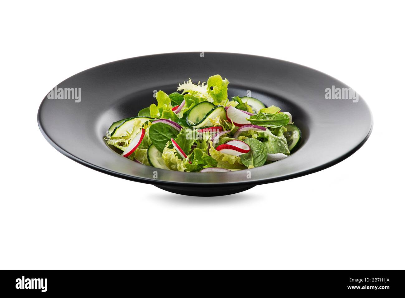 Healthy Green salad with fresh vegetables isolated on white background Stock Photo
