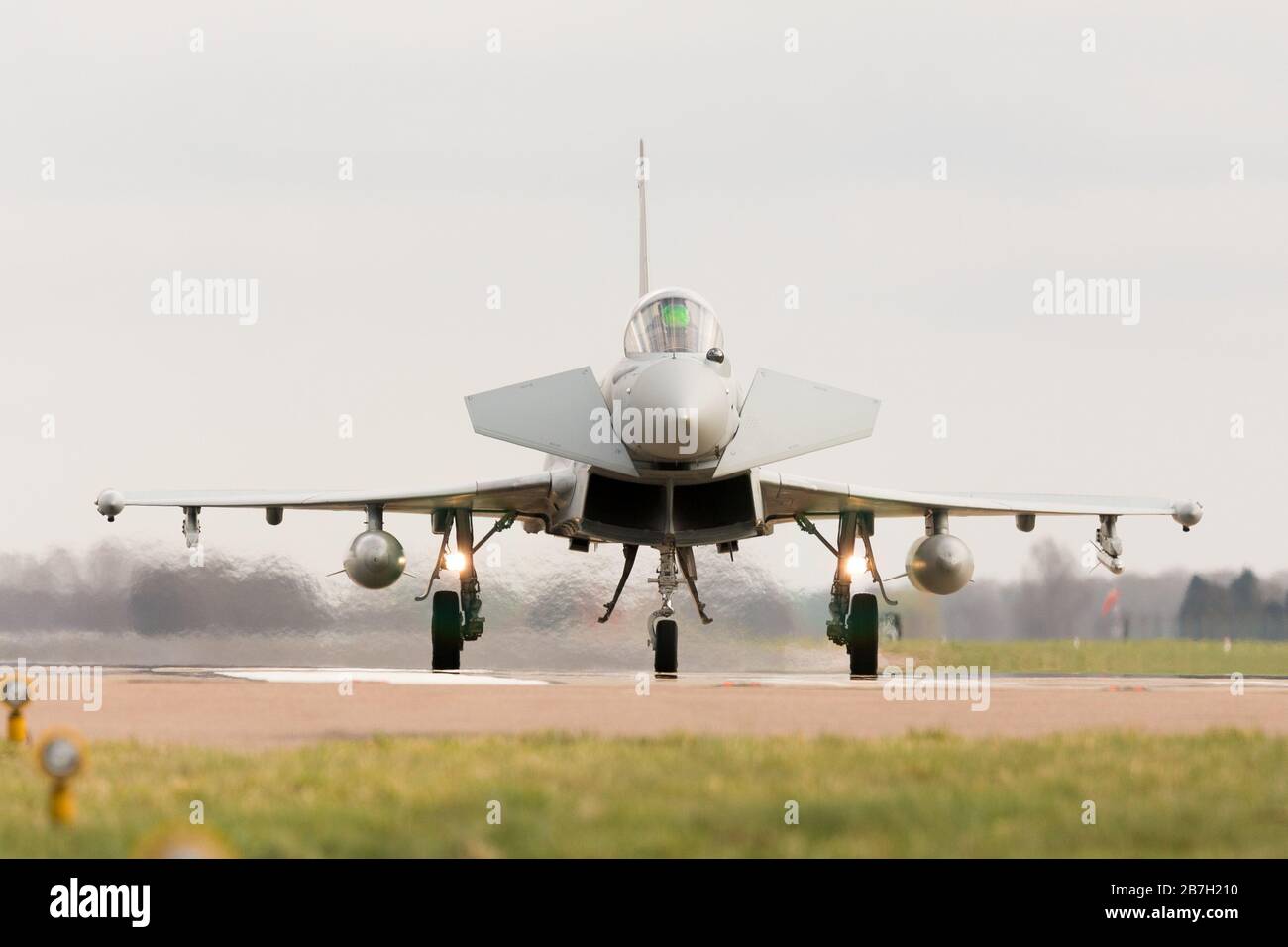 RAF Coningsby, Lincolnshire, UK. 16th Mar, 2020. Typhoon aircraft of 29 squadron landing after a practice flight from Royal Air Force Coningsby, Lincolnshire. RAF airshows later in the year are under threat of postponement or cancellation due to the COVID-19 pandemic. Credit: Peter Lopeman/Alamy Live News Stock Photo