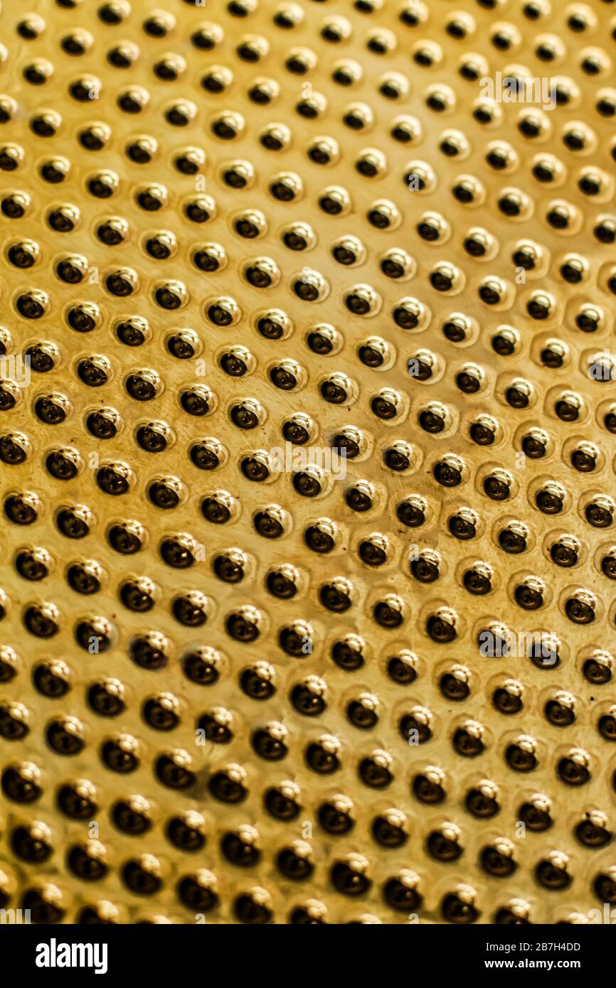 Texture of golden metallic surface as background, materials and ...
