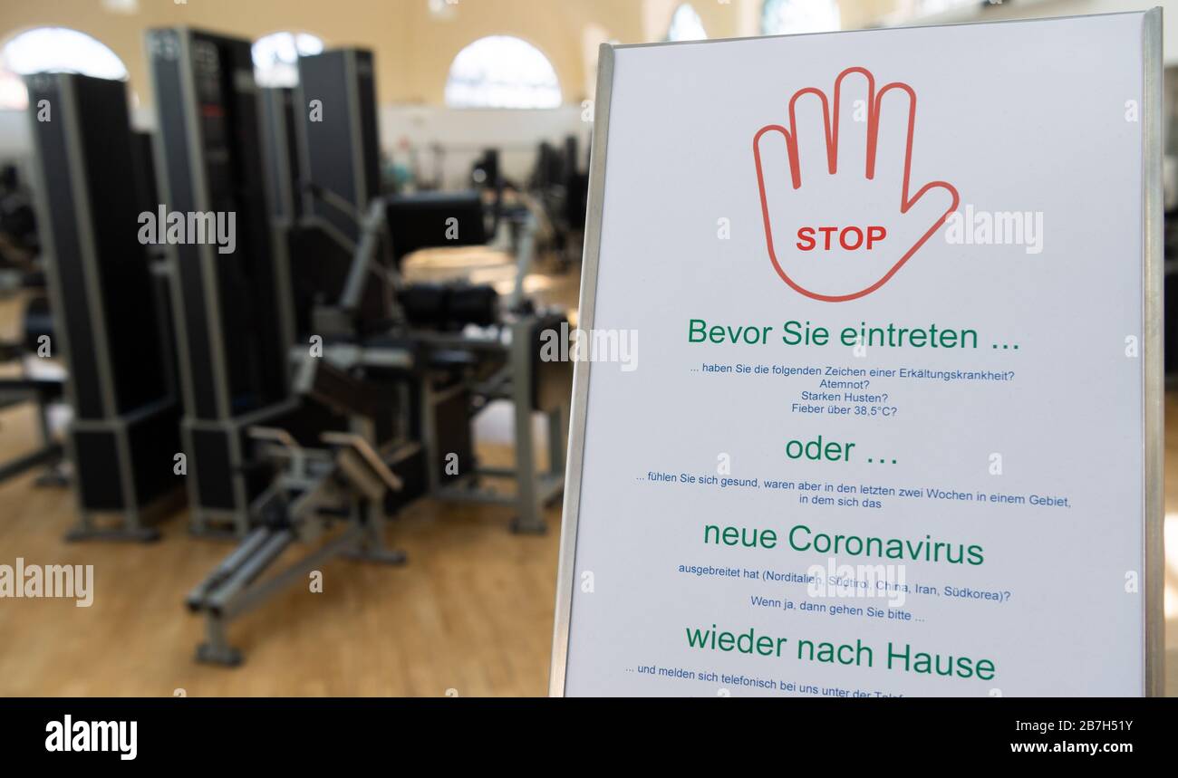 Dresden, Germany. 16th Mar, 2020. There is a stop sign at the entrance of a gym. The effects of the coronavirus epidemic are also felt here. Credit: Robert Michael/dpa-Zentralbild/dpa/Alamy Live News Stock Photo