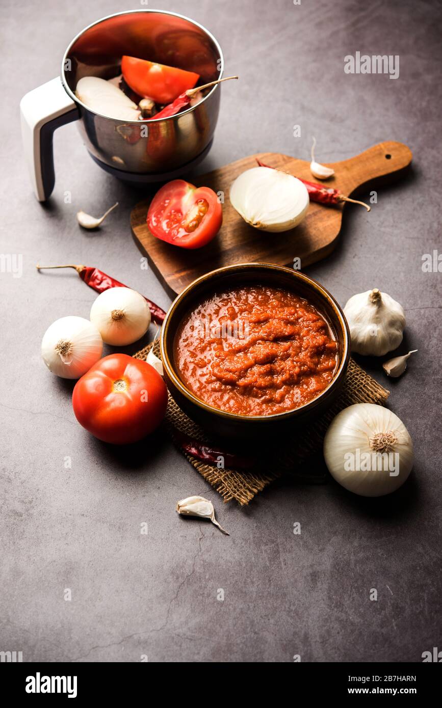 onion tomato masala or puree for indian gravy, served in a bowl with