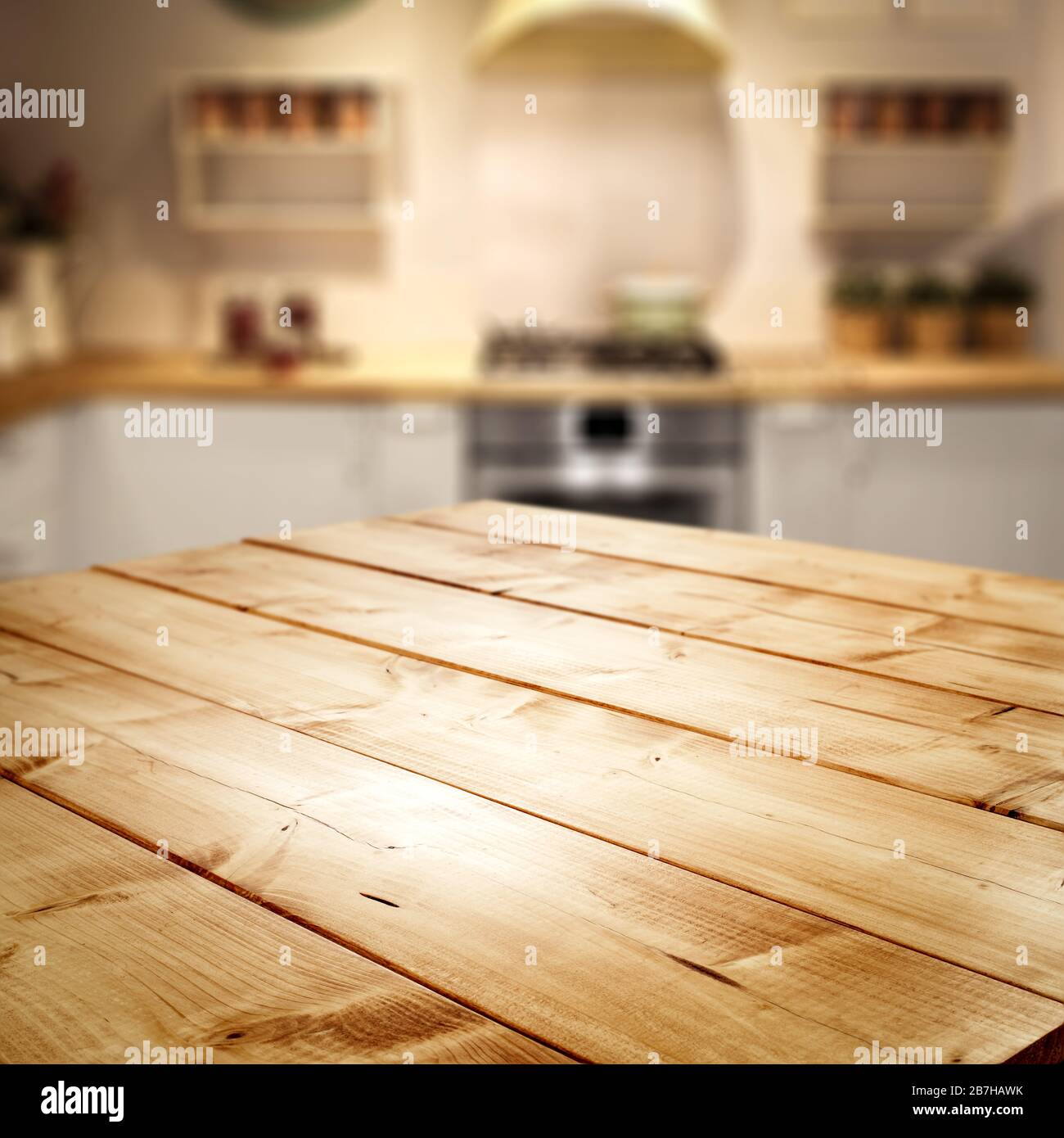 Wooden retro table top with kitchen room interior with retro chic