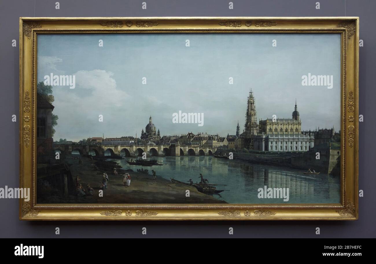 Painting 'Dresden from the Right Bank of the Elbe, bellow the Augustus Bridge' by Italian landscape painter Bernardo Bellotto also known as Canaletto (1748). The Dresden Frauenkirche (Dresdner Frauenkirche), the Augustus Bridge (Augustusbrücke) and the Dresden Cathedral (Katholische Hofkirche) under construction are depicted in the vedute. Stock Photo