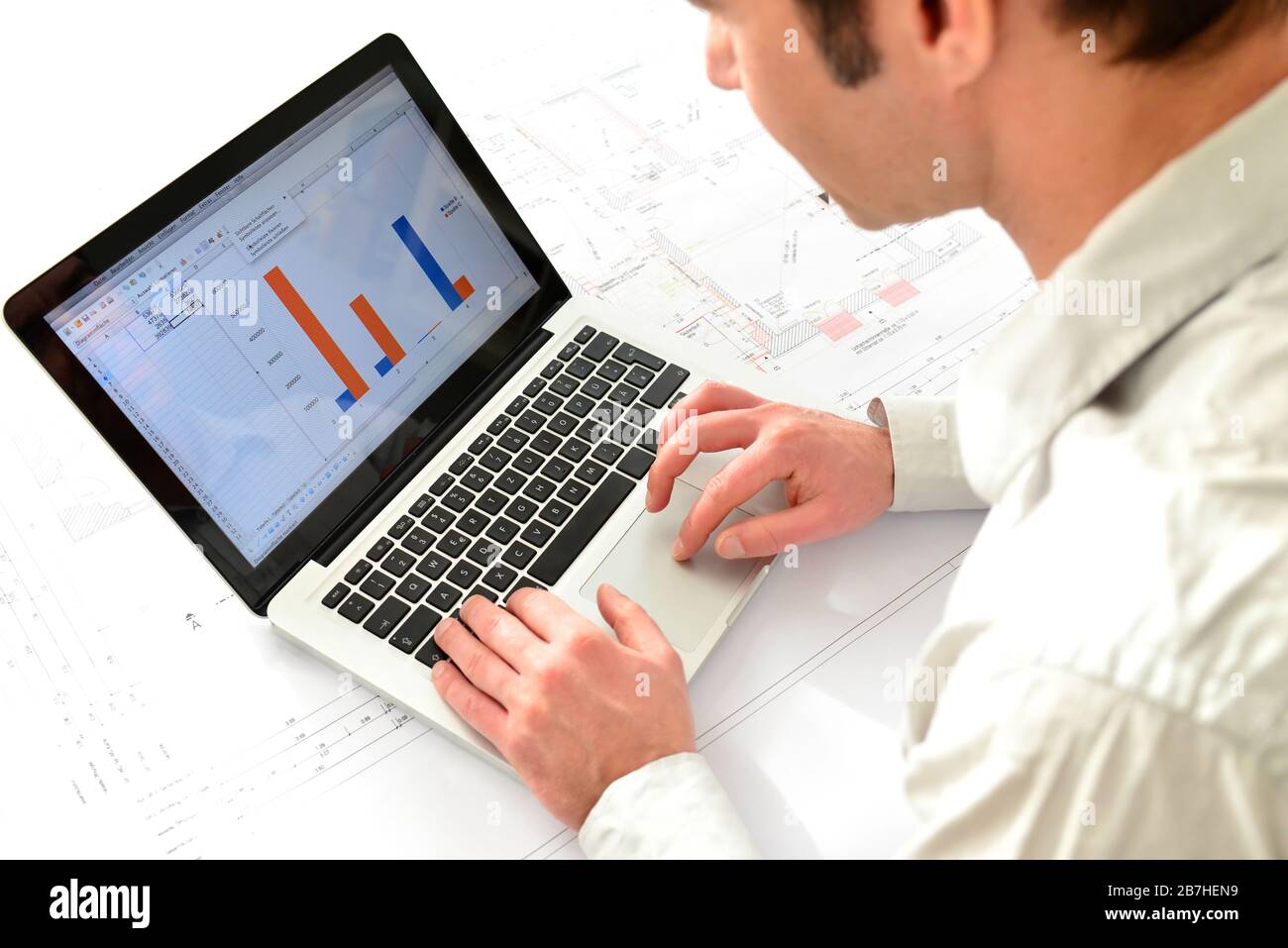 architect at his workplace with notebook - house building and construction in industry Stock Photo