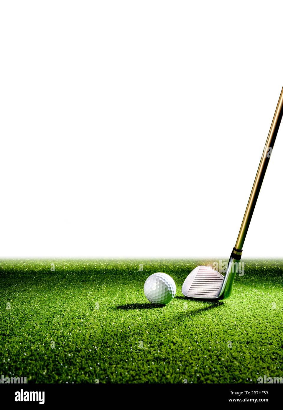 Golf club and golf ball on the turf Stock Photo Alamy