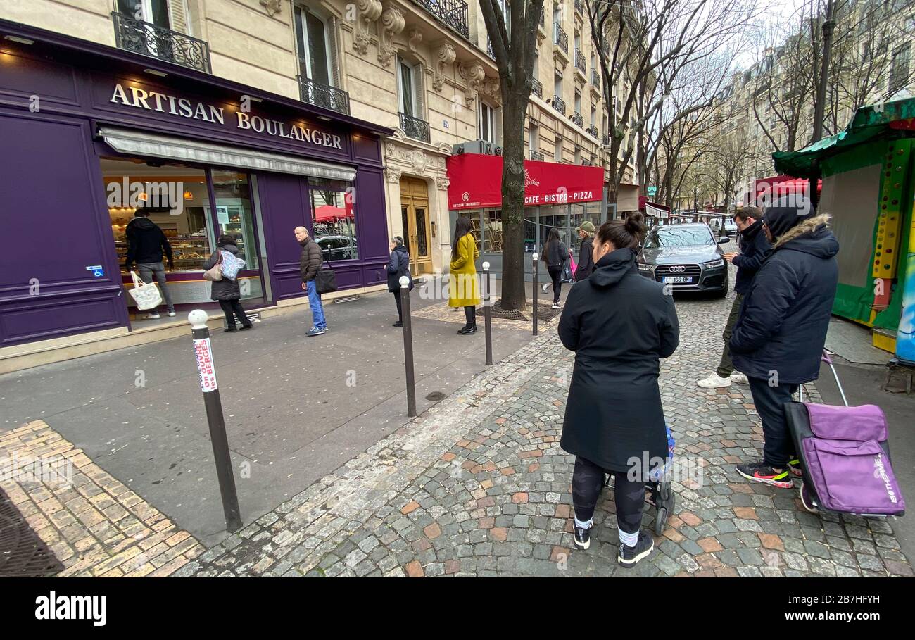 PARISIANS QUEUE FOR FOOD AT SUPERMARKET AFTER CORONAVIRUS OUTBREAK , PARIS  FRANCE Stock Photo