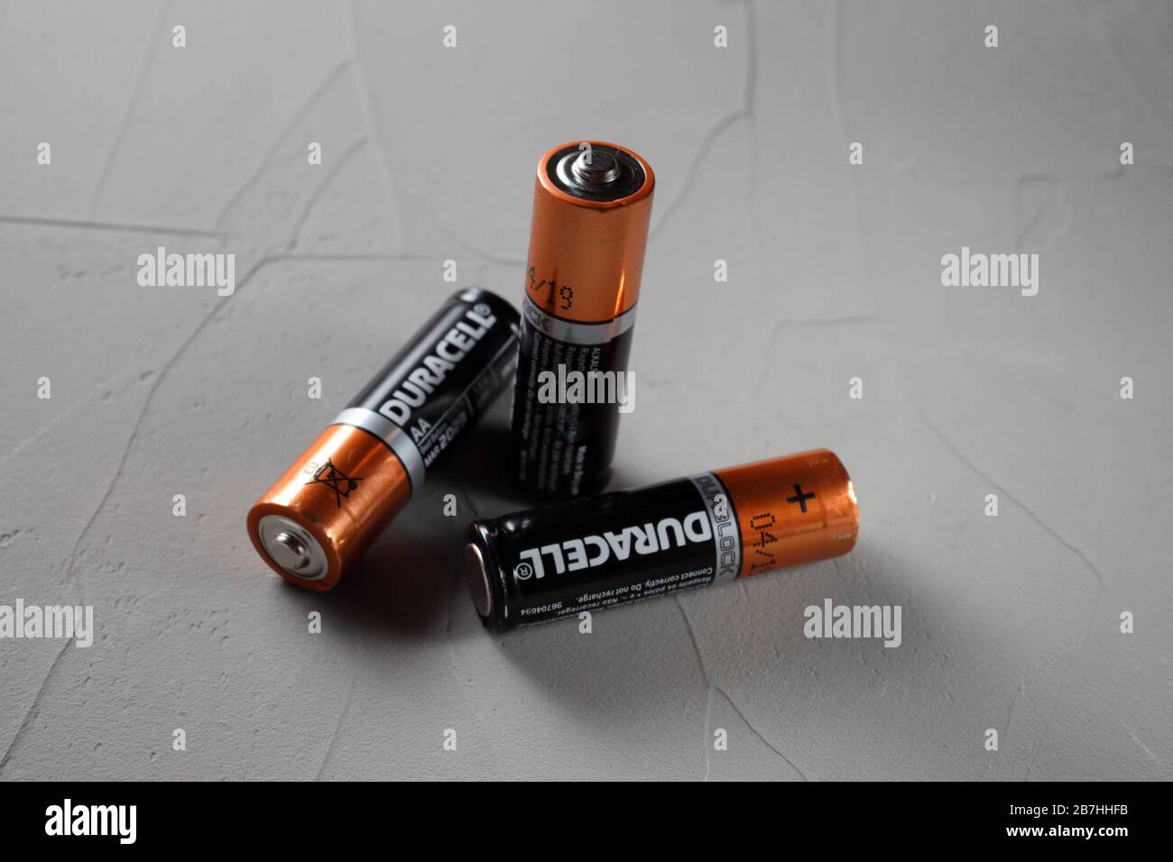 durasel batteries on concrete background Stock Photo Alamy