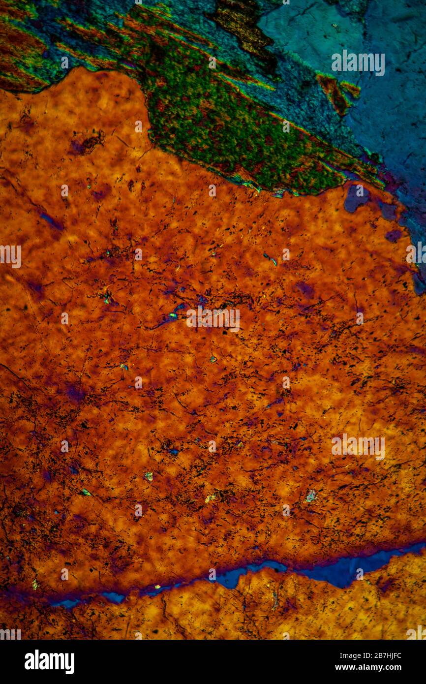 Granite metamorphic deep rock made of quartz, feldspar and mica 100x ...