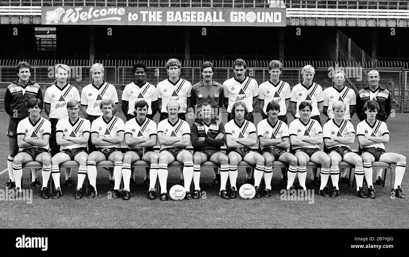 The Derby County FC squad at its Baseball Ground prior to the start of the 1984/85 season in the Canon League Division Three.  (Back row, L-R) Assistant manager Roy McFarland, Billy Livingstone, Paul Blades, Charlie Palmer,Rob Hindmarch, Eric Steele, Richard Pratley, Andy Garner,Mark Clifford, Steve Buckley and physio Gordon Guthrie.  (Front, L-R) Steve Devine, Paul Hooks, Kevin Taylor, Bobby Davison, Kenny Burns, manager Arthut Cox, Steve Powell, Kevin Wilson, John Robertson, Graham Harbey and Andy Irvine. Stock Photo