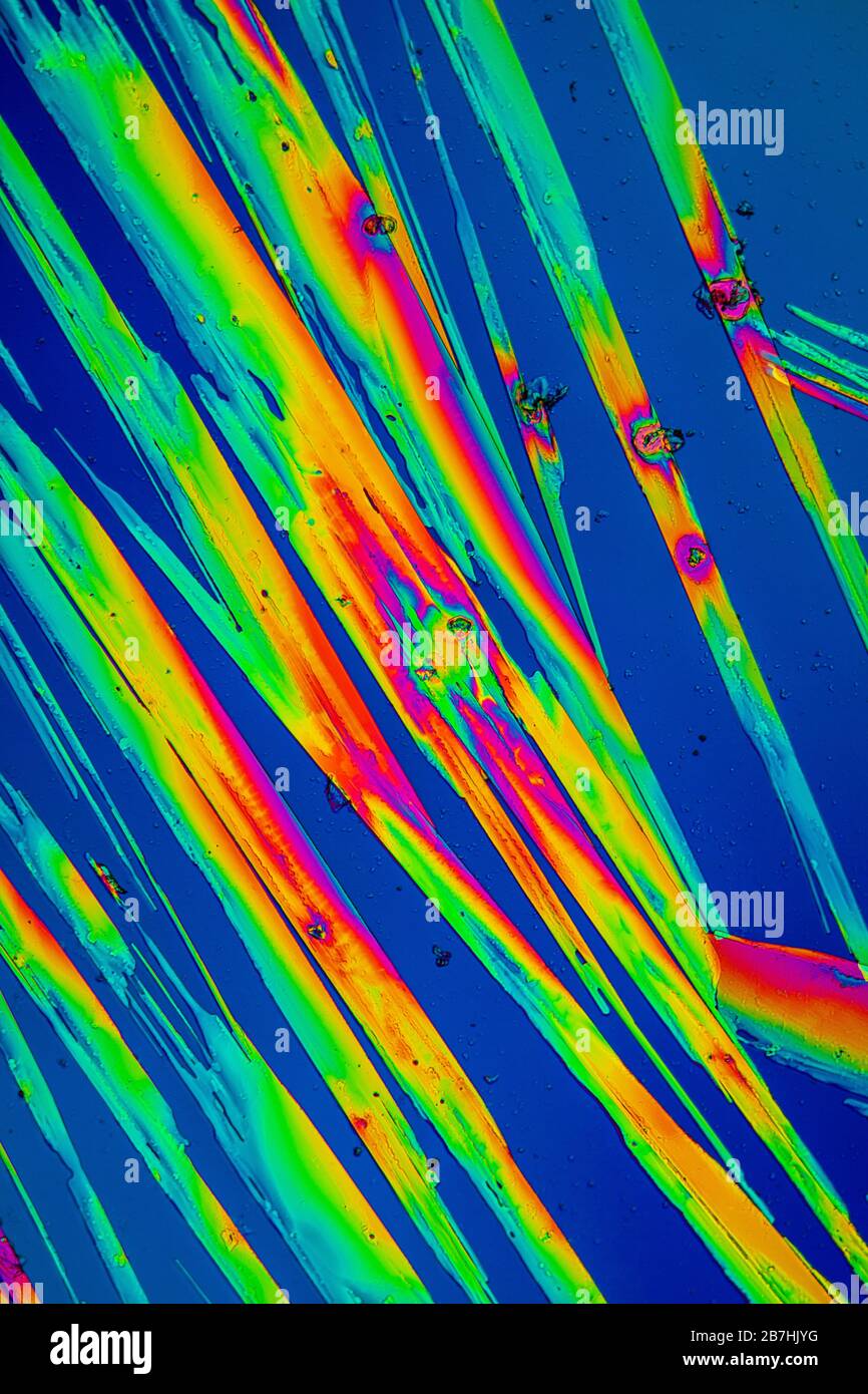 Urea crystals in polarized light under the microscope Stock Photo