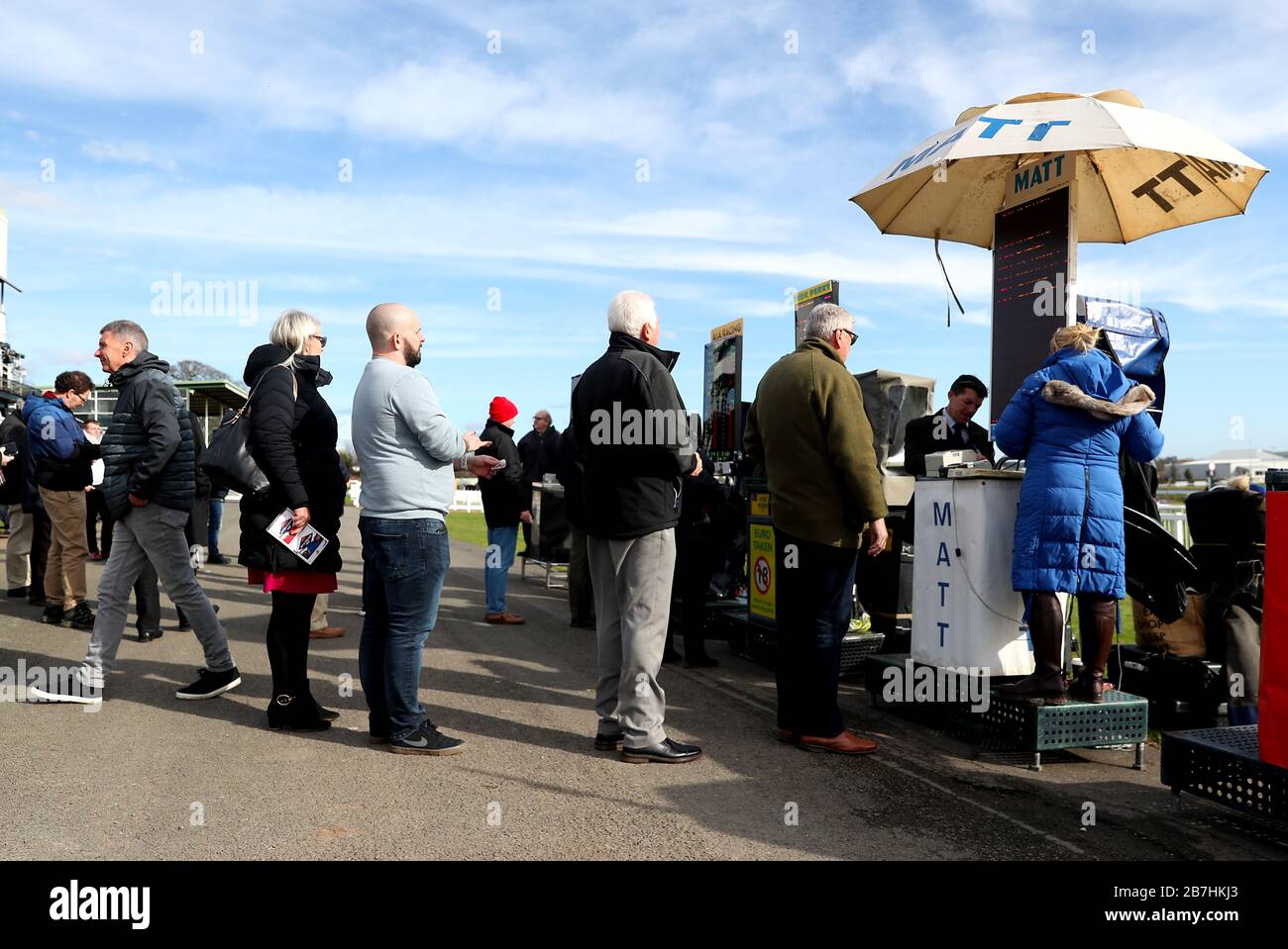 People queue up for the bookie store at Hereford Racecourse. Stock Photo