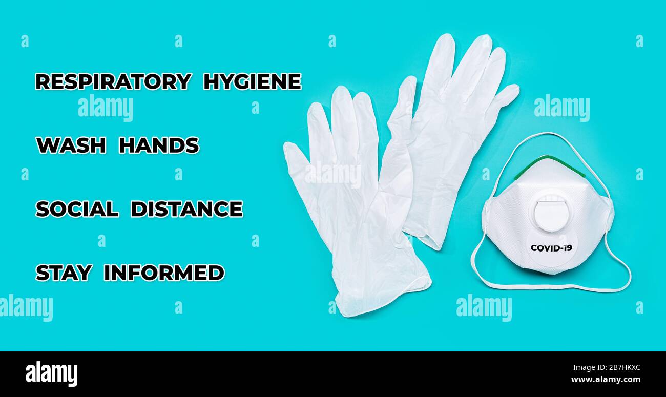 Safety mask and protective gloves with rules to avoid the coronavirus or Covid-19 epidemic Stock Photo