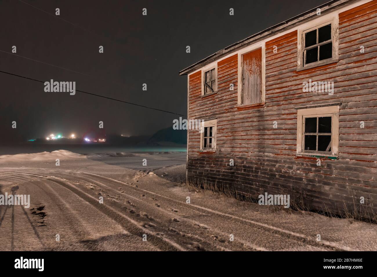 Old clapboard building at night in the old fishing village of Dunfield