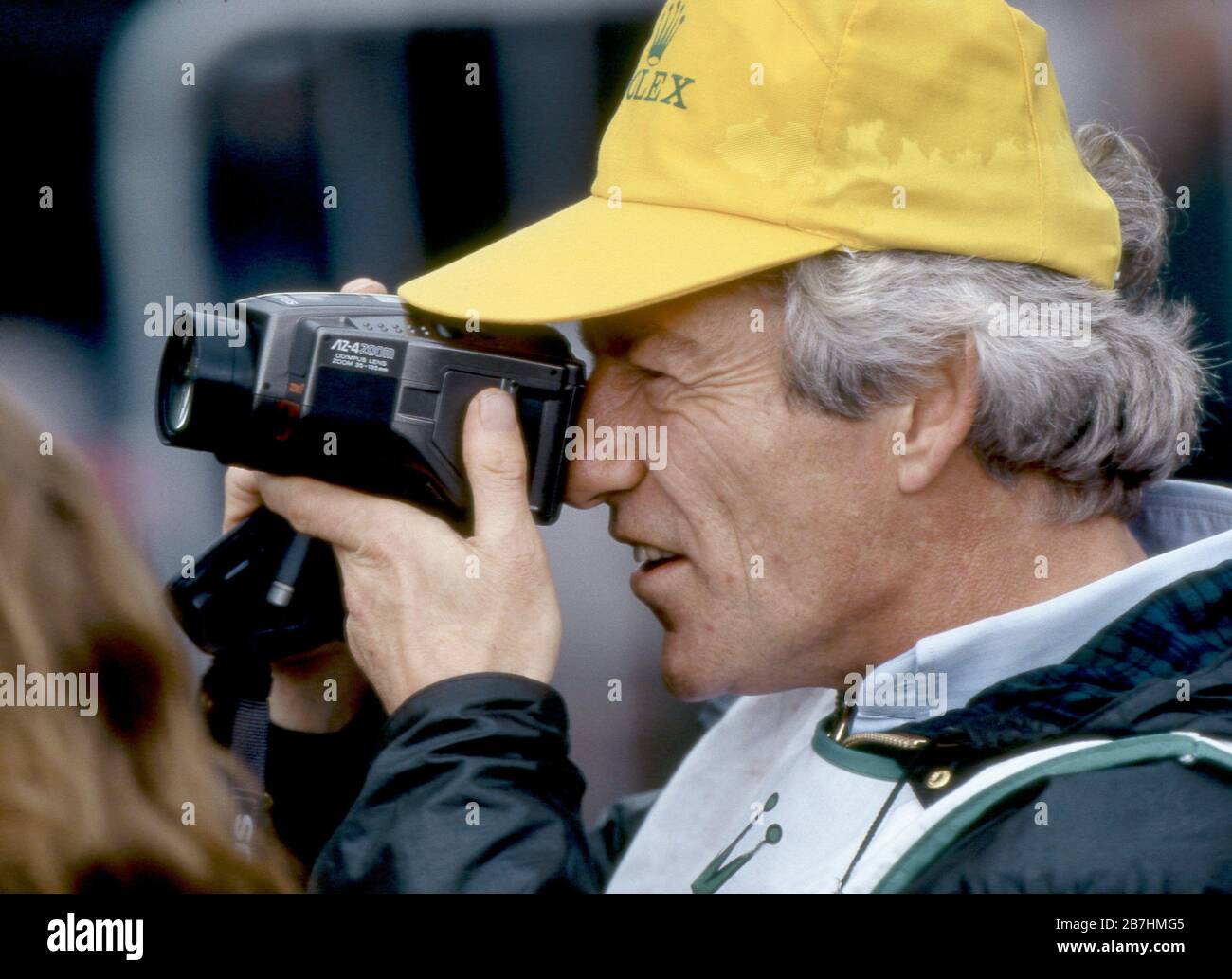 Patrick Lichfield with his Olympus Camera at Gleneagles, Scotland 1990 Stock Photo