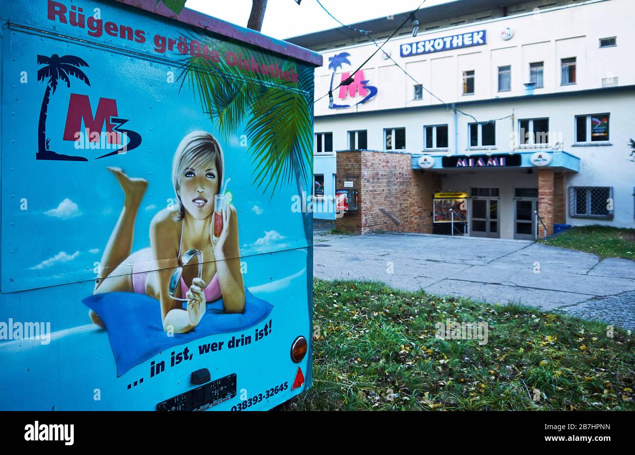 A painted caravan advertises customers for a discotheque in the old Strength through Joy-buildings in Prora on the island of Ruegen. Stock Photo