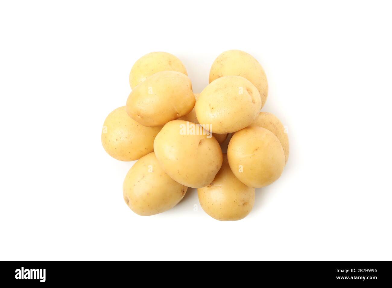 Heap of young potato isolated on white background Stock Photo