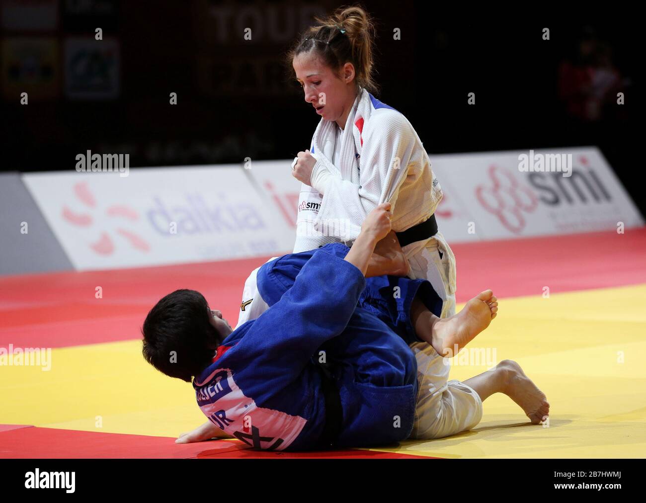 Paris, France - 08th Feb, 2020: Melanie Clement for France (white) against Tugce Beder for Turkey (blue), Women's -48 kg, Round Two (Credit: Mickael Chavet) Stock Photo