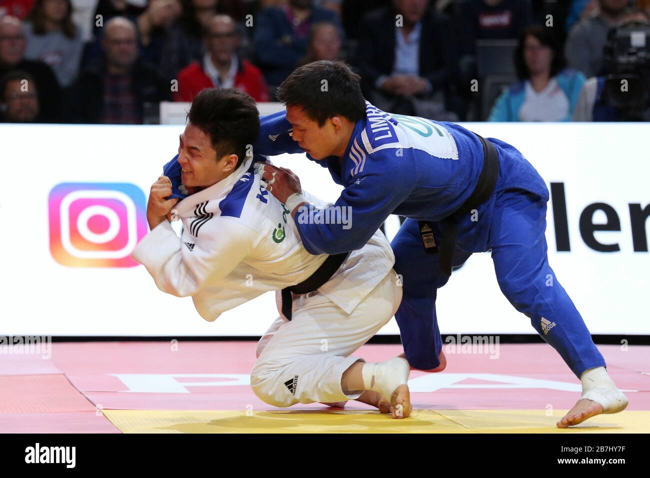 Paris, France - 08th Feb, 2020: Baul An for Korea (white) against Limhwan Kim for Korea (blue), Men's -66 kg, Gold Medal Match (Credit: Mickael Chavet) Stock Photo