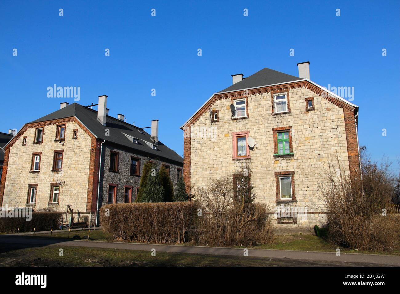 Czeladz, Poland - apartment buildings in Piaski district. Traditional Silesian architecture called 'familok'. Stock Photo