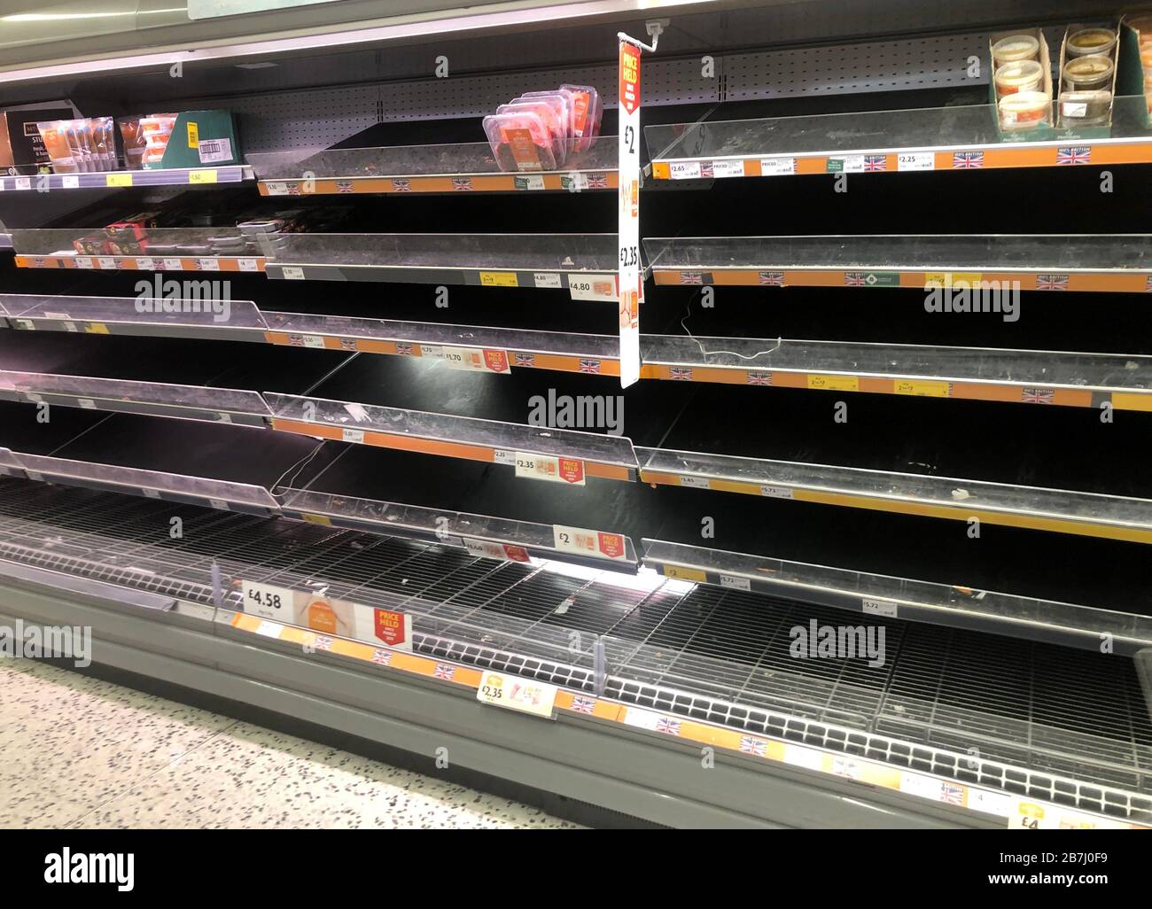 Empty shelves at a Morrisons supermarket in Whitley Bay. Picture date: Monday March 16, 2020. Retailers have reported a rise in abuse of staff amid coronavirus panic-buying, despite supermarkets calling for calm from shoppers. See PA story HEALTH Coronavirus Retail. Photo credit should read: Owen Humphreys/PA Wire Stock Photo