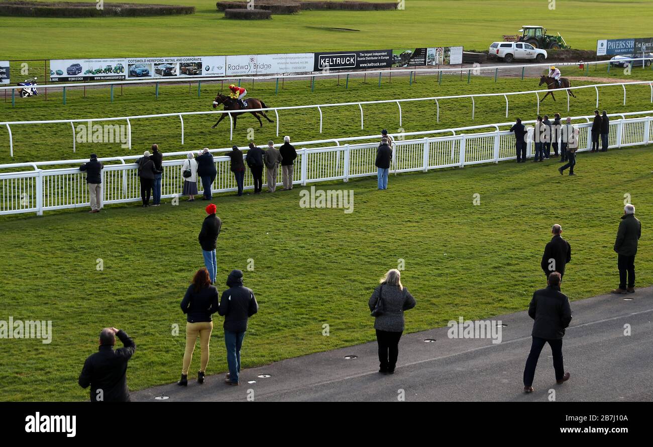 The Edgar Wallace ridden by jockey David Bass wins the Cotswold Hereford Standard Open NH Flat Race at Hereford Racecourse. Stock Photo