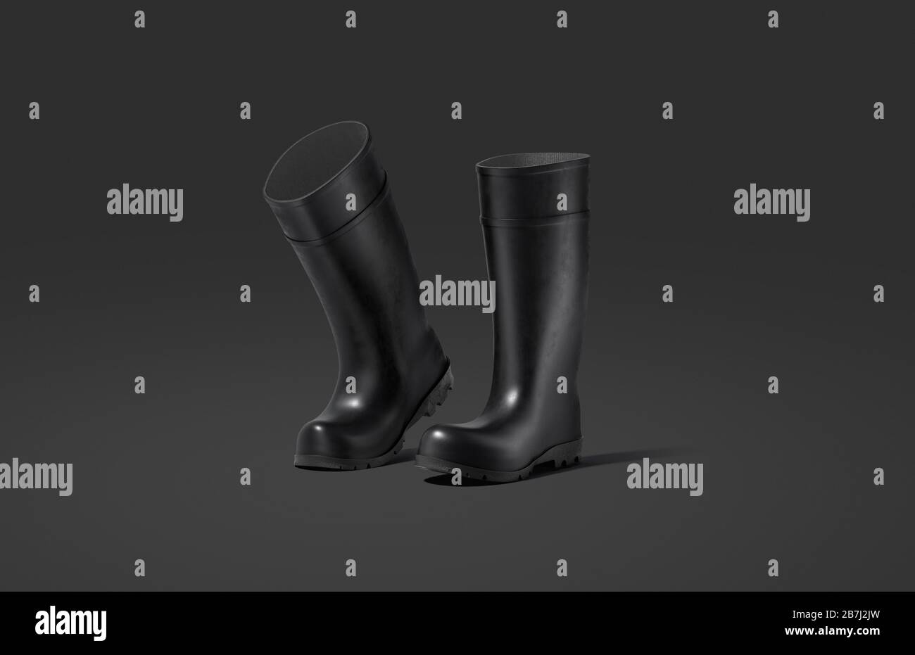 Blank black rubber wellington boots mockup, dark background Stock Photo