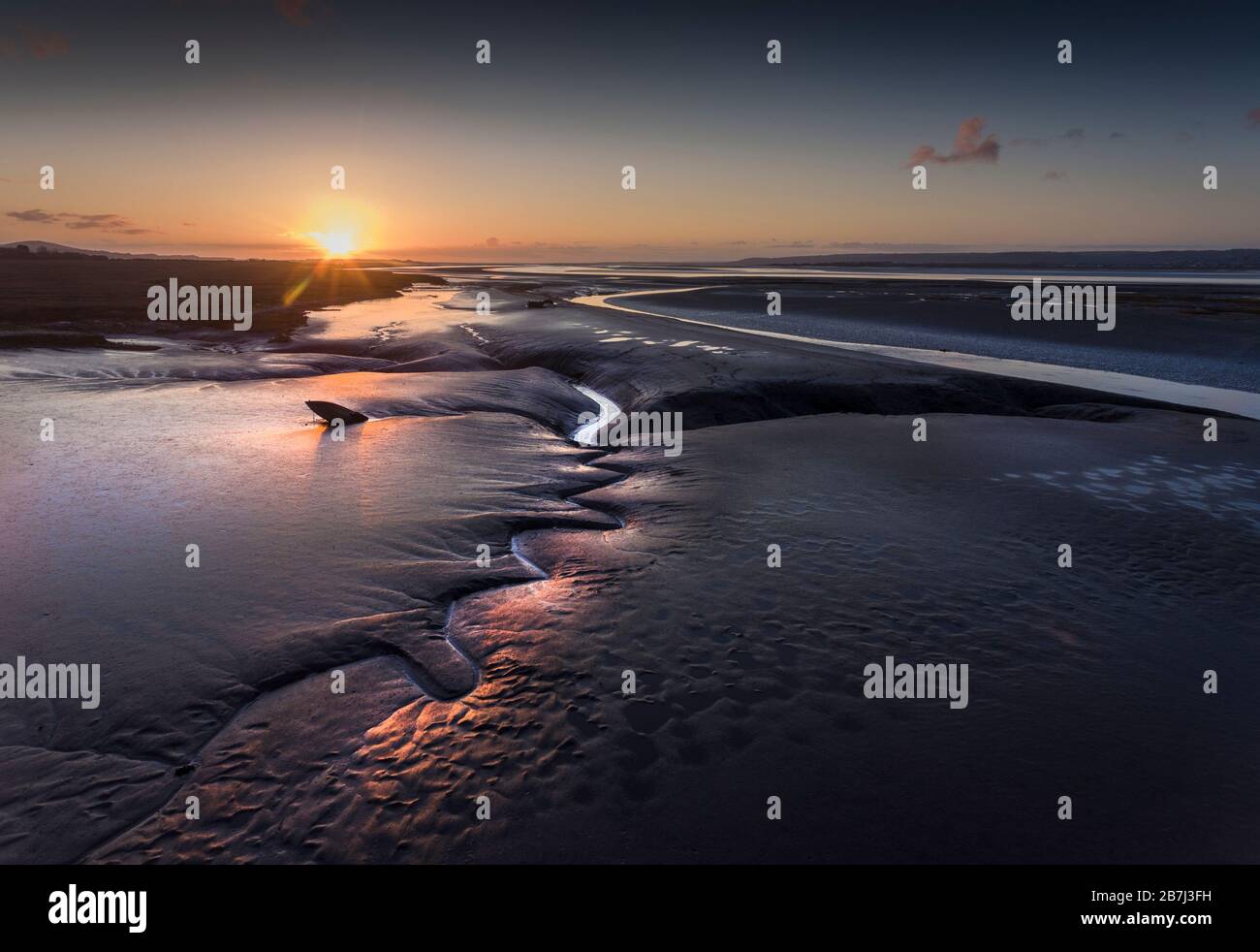 Sunset over the Loughor estuary Stock Photo