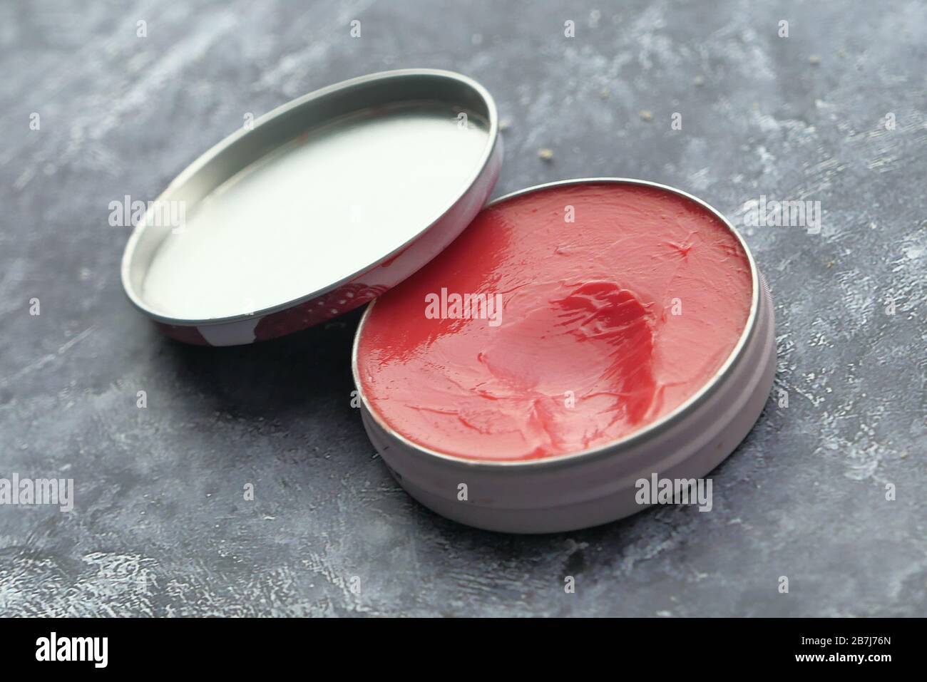 a container with cream oil petroleum jelly Stock Photo Alamy