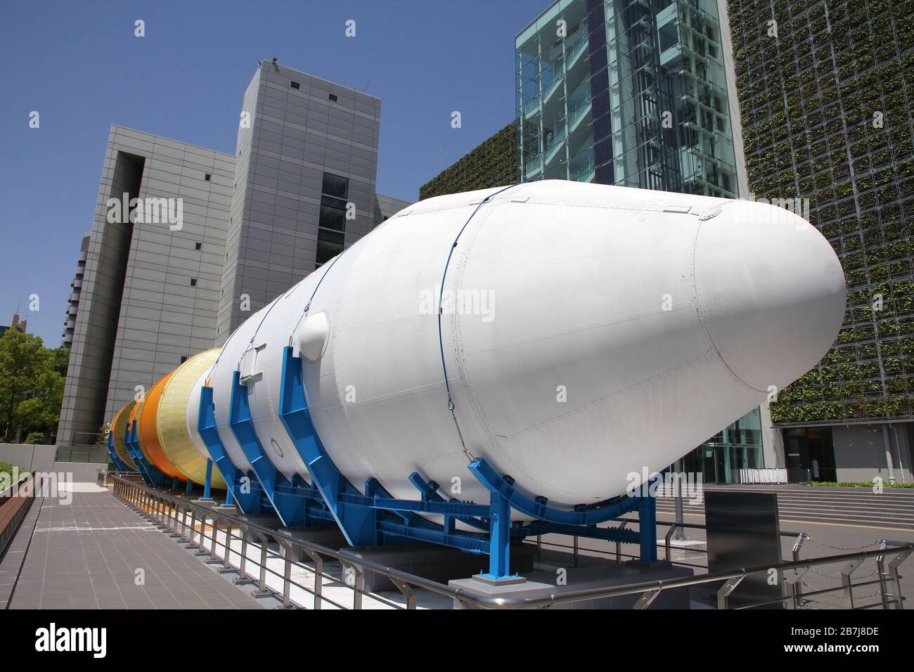 NAGOYA, JAPAN - APRIL 28, 2012: Space rocket in front of Nagoya City ...