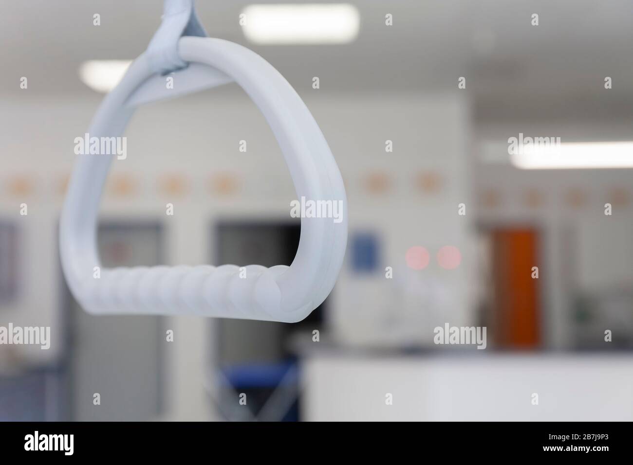 Hospital bed trapeze in intensive care unit in hospital, a place where