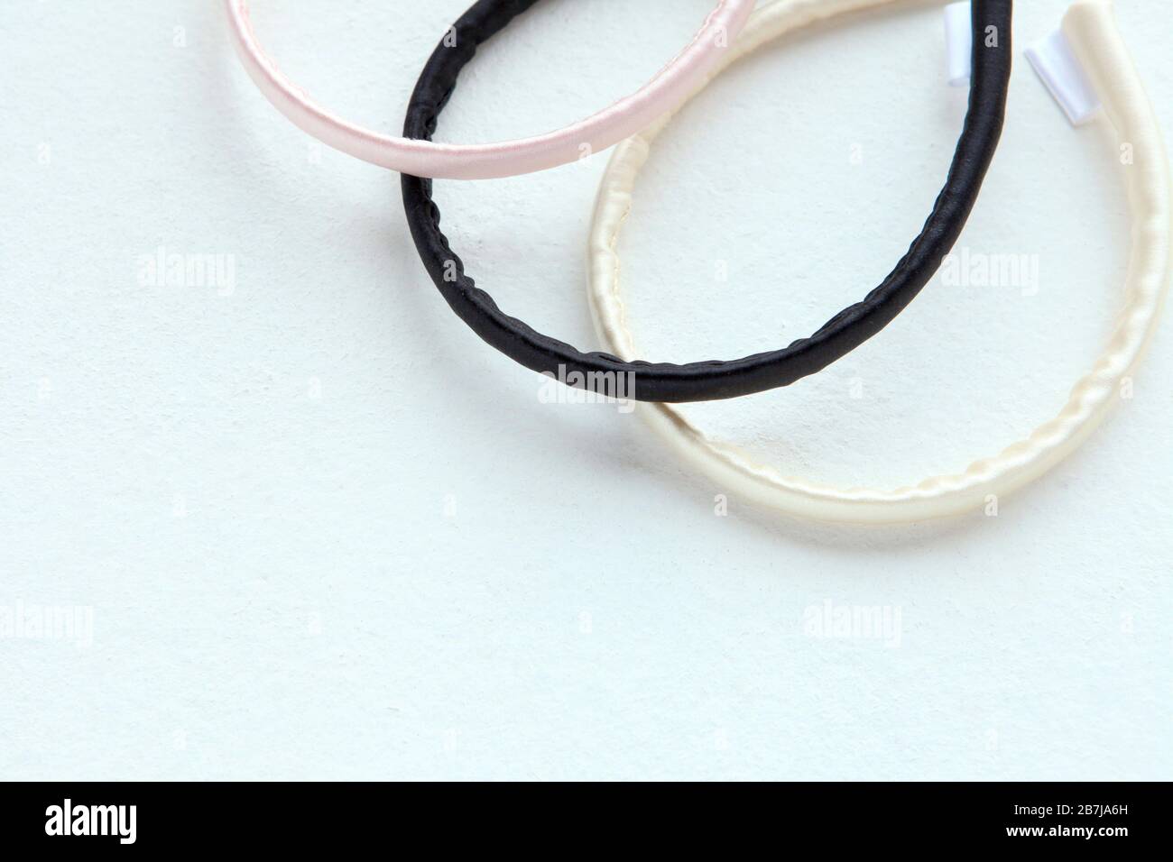 Flat lay Hairdressing tools and accessories as Color Hair Scrunchies, Orbital Hair ring or hair hoop Stock Photo