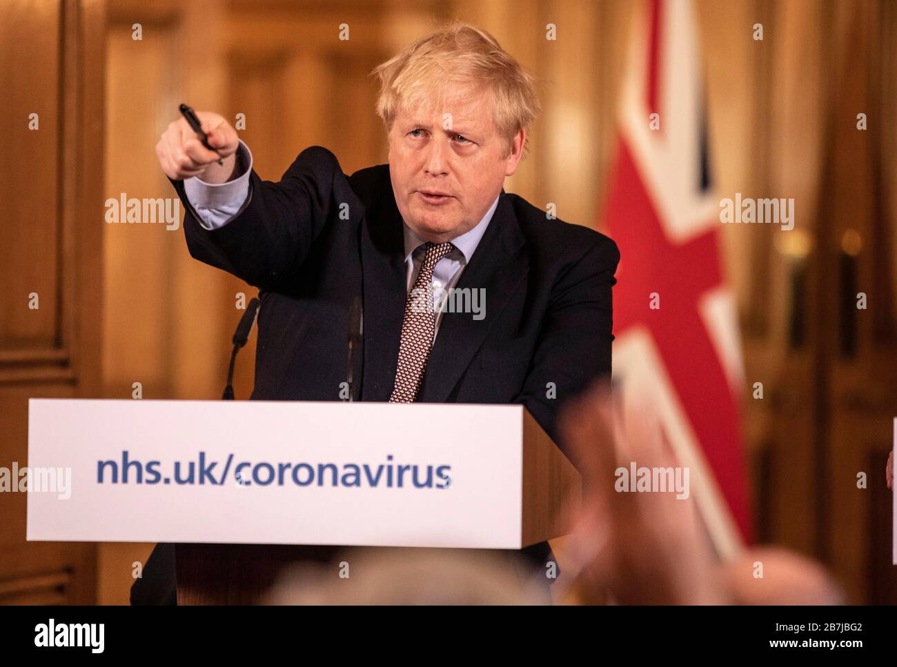 Prime Minister Boris Johnson speaking at a media briefing in Downing Street, London, on Coronavirus (COVID-19) after he had taken part in the government's COBRA meeting. Picture date: Monday March 16, 2020. See PA story HEALTH Coronavirus. Photo credit should read: Richard Pohle/The Times/PA Wire Stock Photo