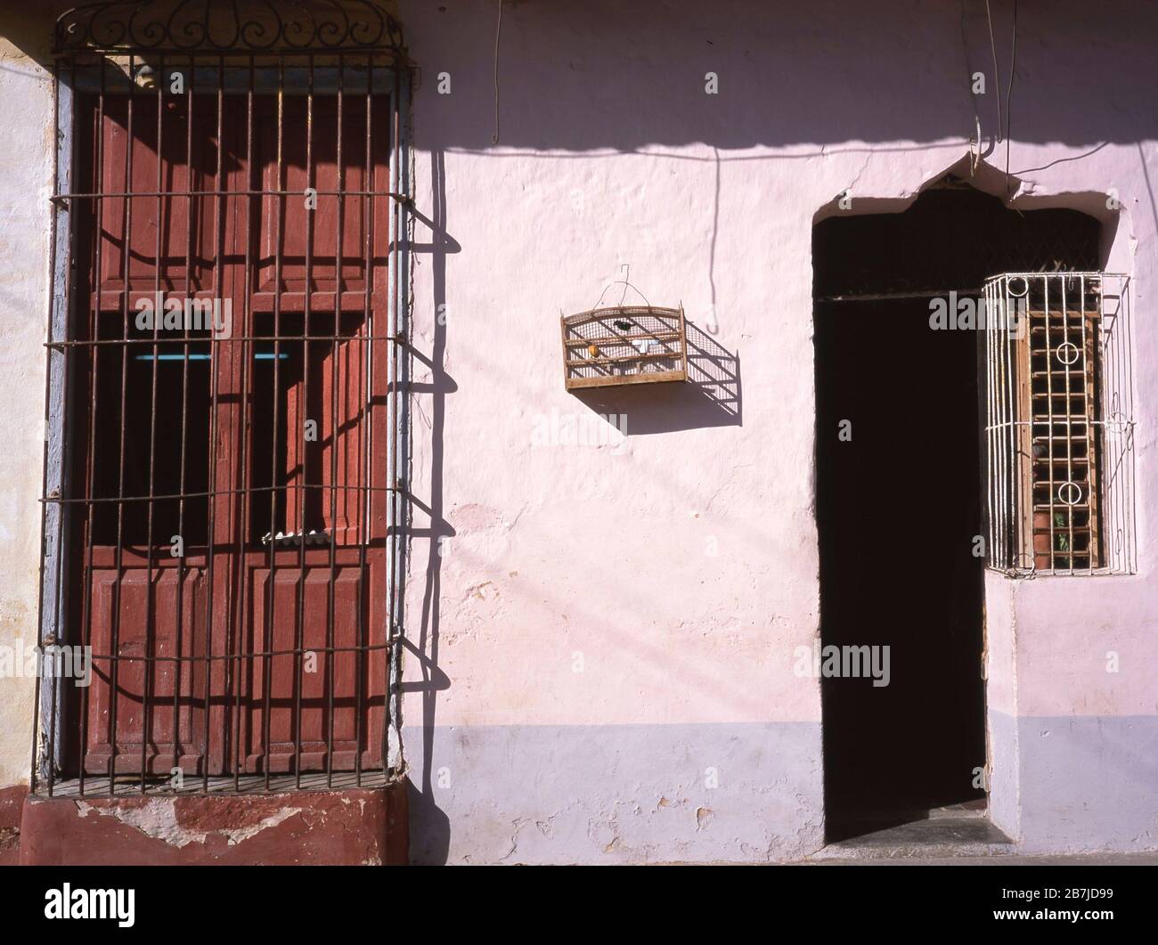 Traditional house with bird cage in Trinidad, Cuba, West Indies, Central America Stock Photo