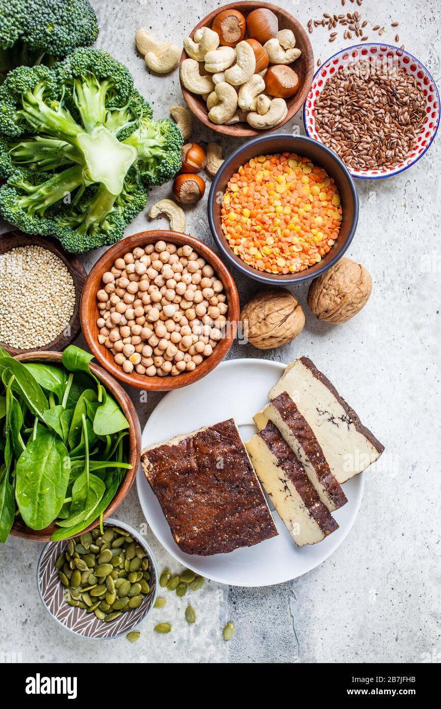 Vegan sources of protein background, top view. Tofu, chickpeas, lentils