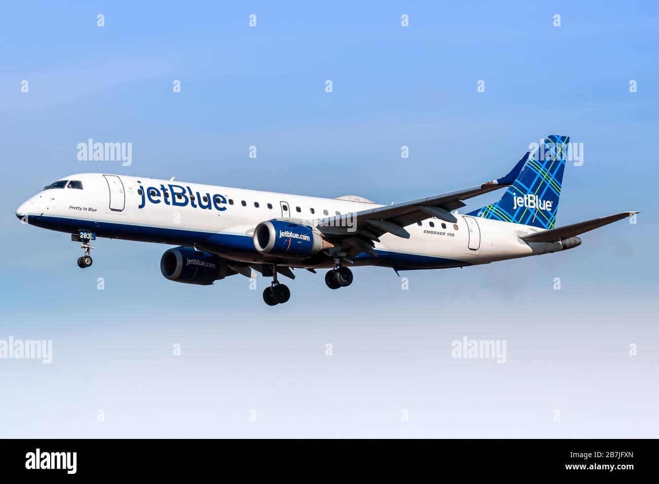 New York, USA - February 29, 2020: JetBlue Embraer 190 airplane at New York John F. Kennedy airport (JFK) in the USA. Embraer is an aircraft manufactu Stock Photo