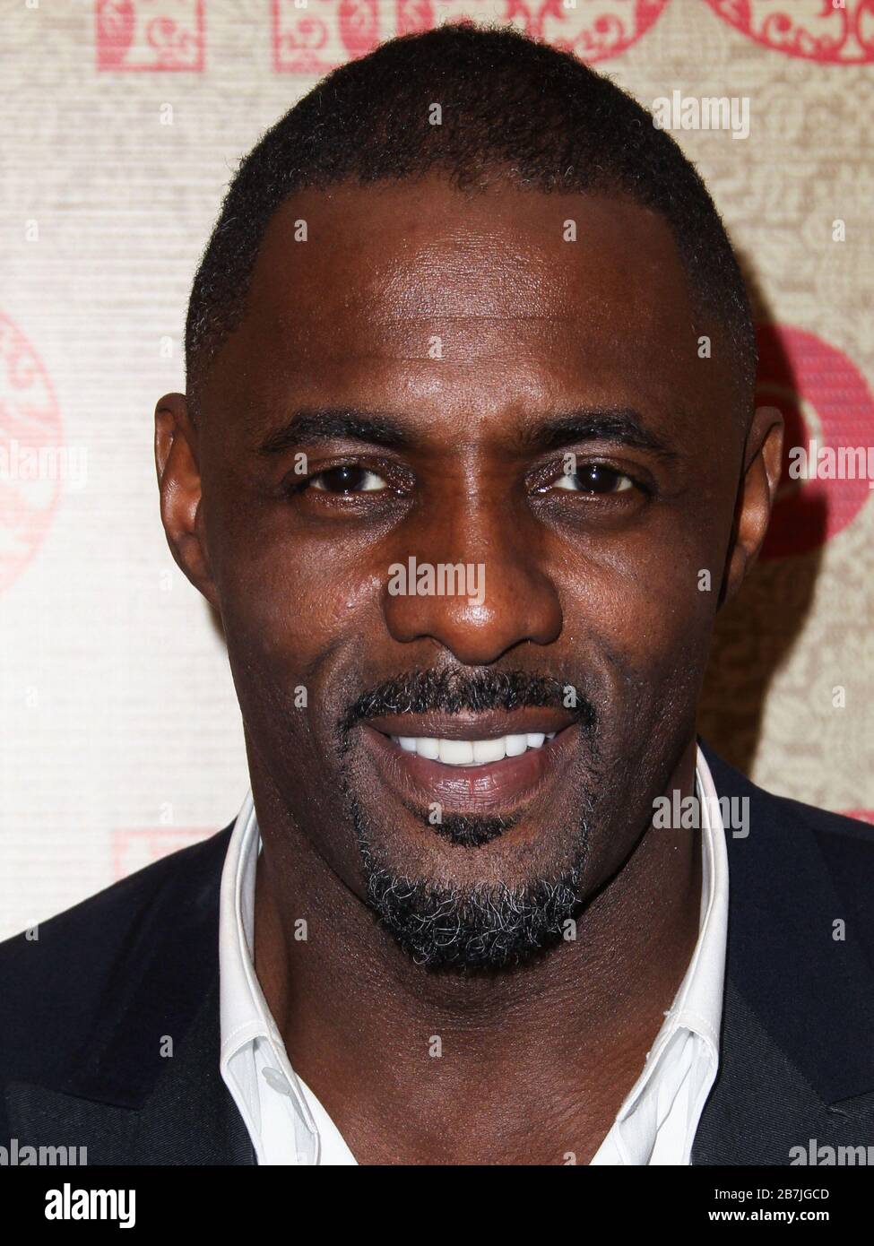 (FILE) Idris Elba Tests Positive for Coronavirus COVID-19. Idris Elba has tested positive for coronavirus, the actor said on Monday, March 16, 2020 on Twitter. BEVERLY HILLS, LOS ANGELES, CALIFORNIA, USA - JANUARY 12: Actor Idris Elba arrives at HBO's Official Golden Globes After Party 2014 held at the Circa 55 Restaurant at The Beverly Hilton Hotel on January 12, 2014 in Beverly Hills, Los Angeles, California, United States. (Photo by Xavier Collin/Image Press Agency) Stock Photo
