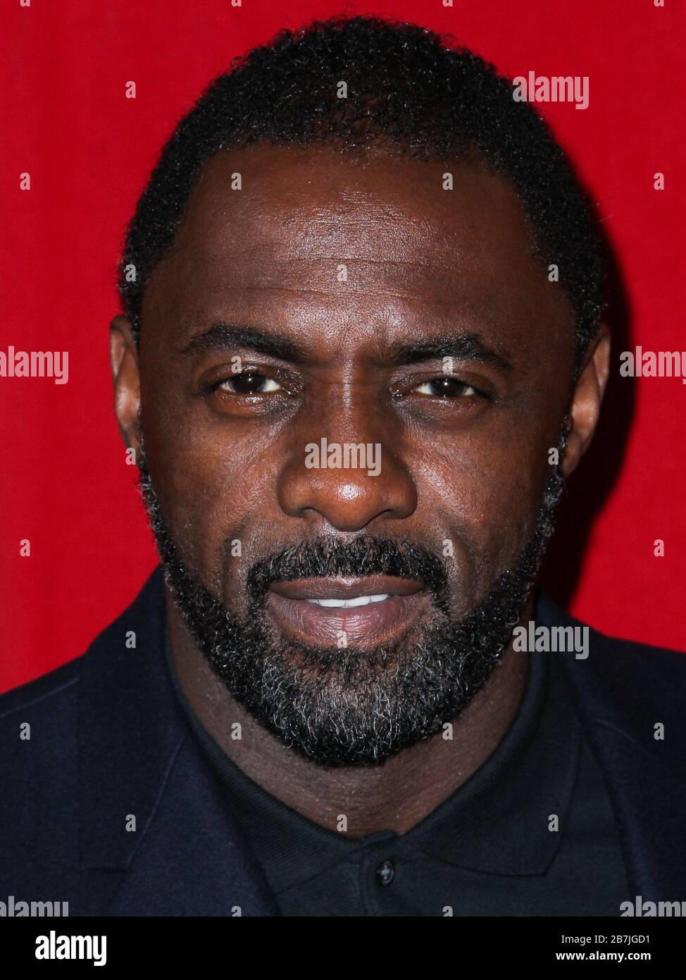 (FILE) Idris Elba Tests Positive for Coronavirus COVID-19. Idris Elba has tested positive for coronavirus, the actor said on Monday, March 16, 2020 on Twitter. HOLLYWOOD, LOS ANGELES, CALIFORNIA, USA - NOVEMBER 10: Actor Idris Elba arrives at the AFI FEST 2013 - 'Mandela: Long Walk To Freedom' Special Screening held at American Cinematheque's Egyptian Theatre on November 10, 2013 in Hollywood, Los Angeles, California, United States. (Photo by Xavier Collin/Image Press Agency) Stock Photo